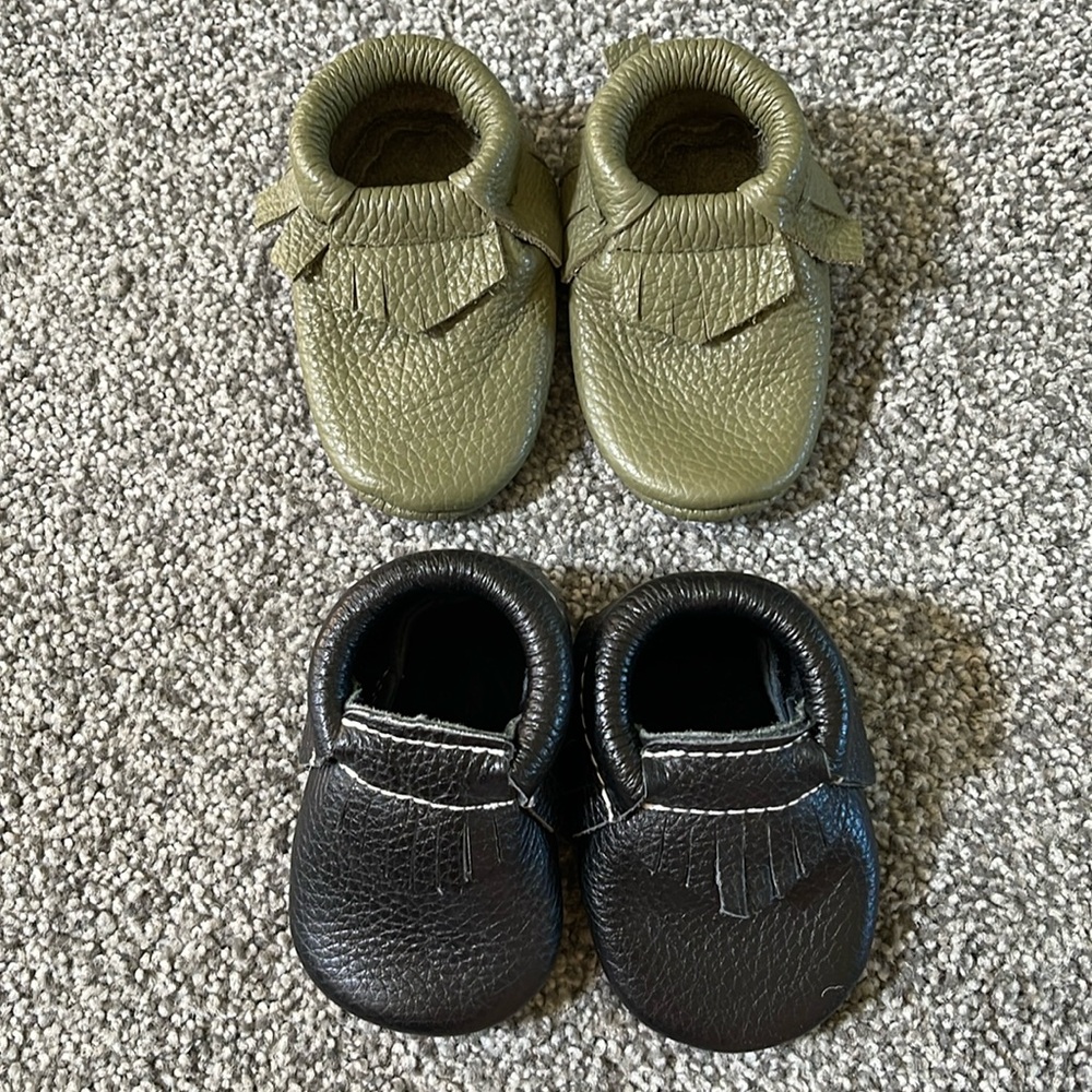 Leather baby moccasins. New born and 6 months. Never worn.